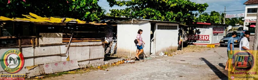 Imagem histórica da Folha do Valentina / Bytegames / Spynet no bairro Valentina Figueiredo, João Pessoa, registrada no início dos anos 2000, mostrando comerciantes em cenário urbano de dificuldades e transformação social.